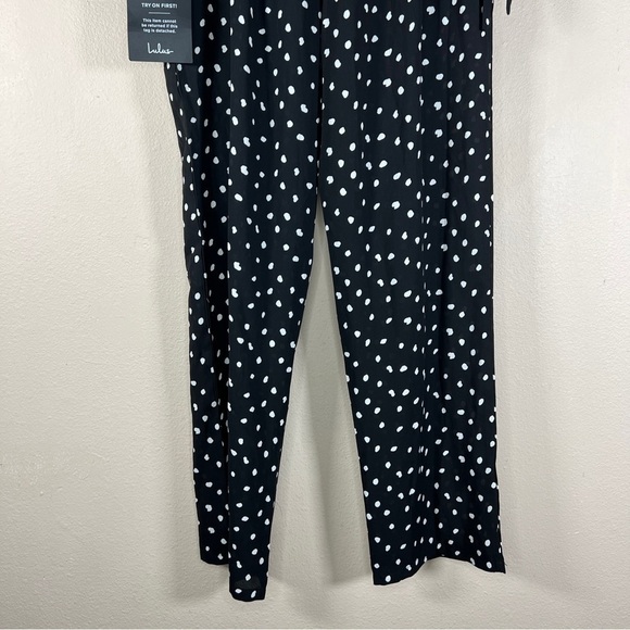NEW LULUS XS JUMPSUIT BLACK WHITE POLKA DOT V NECK ASYMMETRICAL SLEEVE RETRO - Picture 7 of 15